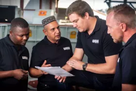 Second from left, Faizal Mahomed, Client Services Manager at Weba Chute Systems, and third from left, Izak Potgieter, ISO Systems Manager at Weba Chute Systems, are in the process of validating the quality control procedure at the Germiston factory. (Pictures: ©Weba Chute Systems)
