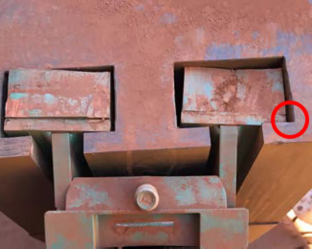 Fig. 20: Impact Saddle rubber cushioning system; a sharp radius in this inner corner (marked by a red circle in the picture) may be contributing to UHMWPE saddle failure.
