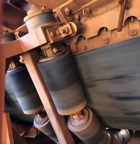 Fig. 18: Rubber lagged catenary idlers trialled in the impact area.
