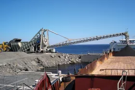 Stormajor loading Gabros rock for aggregate onto a barge in Russia.
