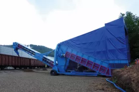 Loading Melafyr (Basalt) via Storemajor to railcars in Poland.
