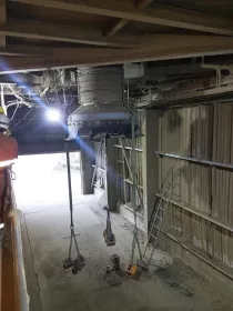The telescopic export chute in raised position under proof load test. (Pictures: ©Hoist and Winch Ltd.)