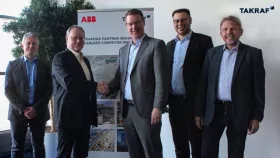 From left to right: Ulf Richter (ABB Product Manager Mining Conveyor Systems), Frank Kschamer (ABB Head of Sales Mining Germany), Thomas Jabs (TAKRAF Group CEO), Frank Enderstein (TAKRAF Group Head of Sales &amp; Marketing), Daniel Greune (TAKRAF Group Vice President Systems)
